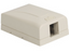 Ivory 1-port Elite surface mount box for network cabling, showing front slot opening and compact rectangular design