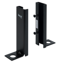 Black ladder rack floor anchor kit showing two vertical mounting brackets with base plates and adjustment bolts for securing…