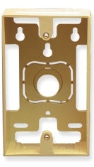 Ivory single gang surface mounting box with cutout for outlet, showing brass hardware and wall-mount slots