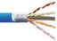 Cat6A shielded network cable with blue jacket showing twisted pair conductors and drain wire exposed