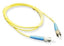 Yellow ST-ST simplex single mode fiber optic patch cable with blue connectors, 10 meters long