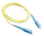 Yellow SC-SC simplex single mode fiber patch cable with blue connectors, 1 meter length