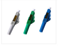 Three SC UPC mechanical connectors in gray, green, and blue with 900um single mode fiber optic cable compatibility