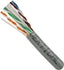 Vertical Cable Cat6A 10Gb UTP networking cable spool showing twisted pair conductors in grey jacket