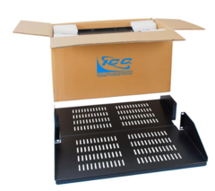 Black vented double-sided rack shelf 20 inches deep with cable management slots, shown in open cardboard shipping box