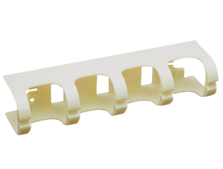ICC 110 cable management block with four white snap-in clips mounted on cream-colored base, designed for structured cabling Main image