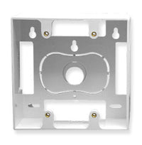 White double gang wall plate mounting box with internal cable routing channels and brass mounting screws