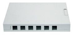 White 12-port surface mount box with six network cable ports arranged horizontally on front panel