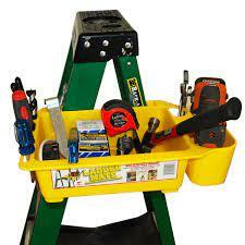 Yellow ladder caddy tool and accessories tray with multiple compartments holding various tools, mounted on green ladder rails